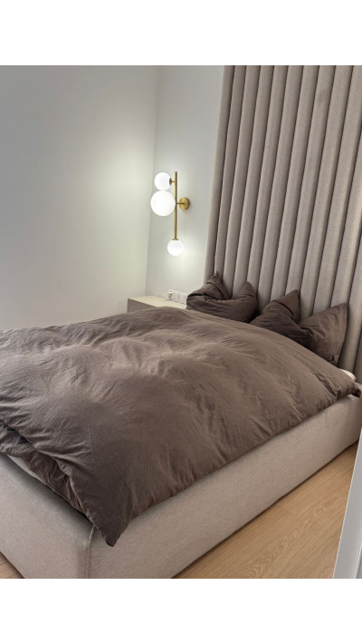 Beige Upholstered Bed with Upholstered Panels