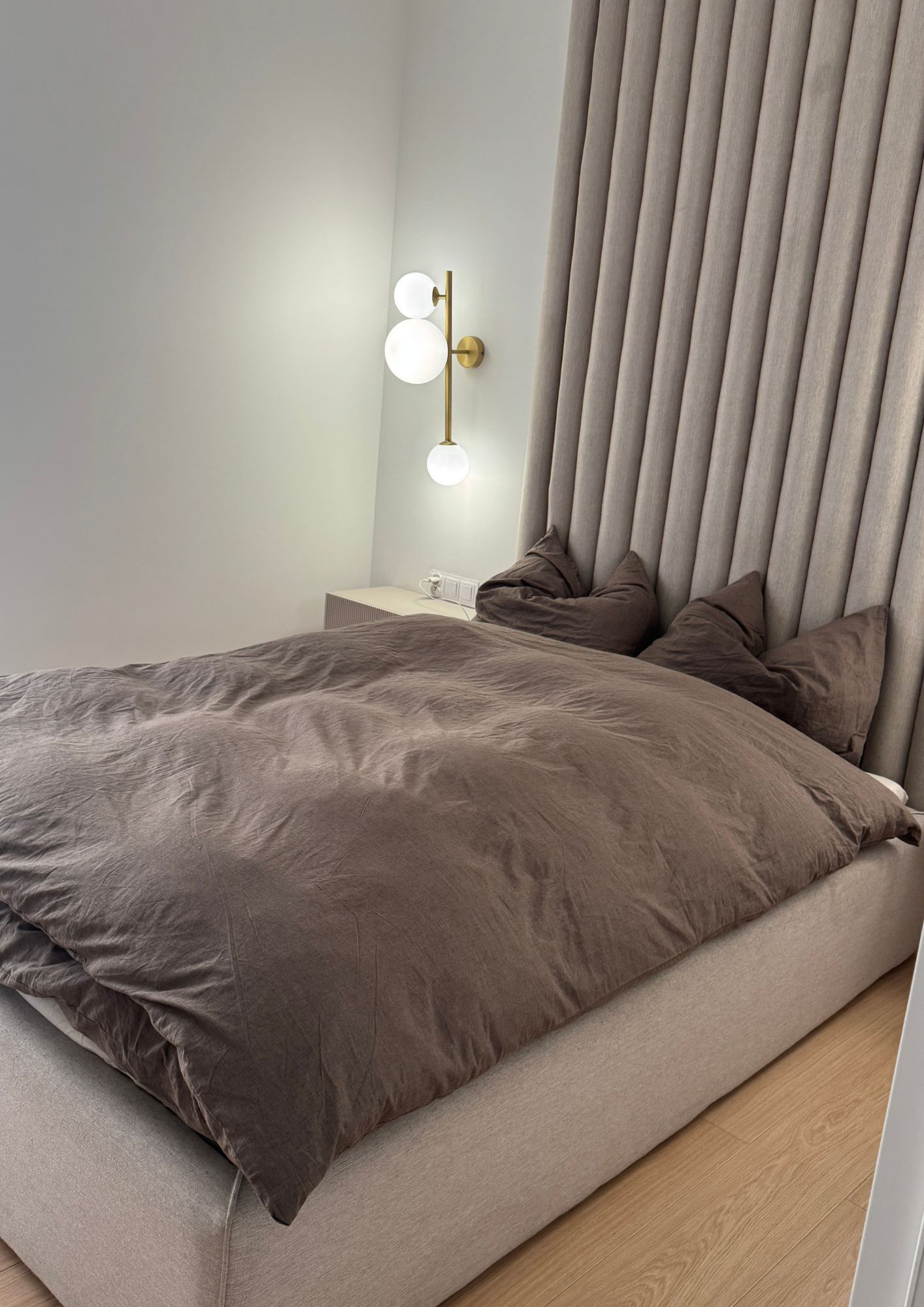 Beige Upholstered Bed with Upholstered Panels