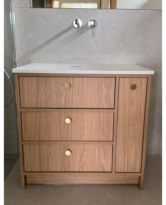 Freestanding bathroom cabinet with three drawers and a side cabinet in the Casella Natural finish