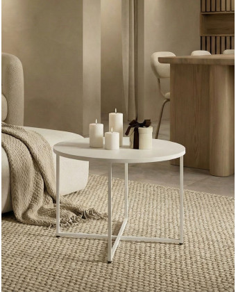 Biały okrągły stolik z matowym blatem – prostota i styl