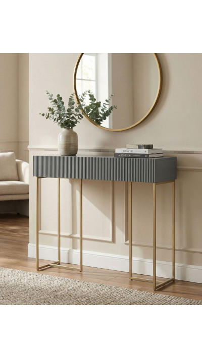 A modern entryway console table with a grooved front A modern entryway console table with a grooved front