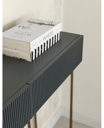 A modern entryway console table with a grooved front A modern entryway console table with a grooved front