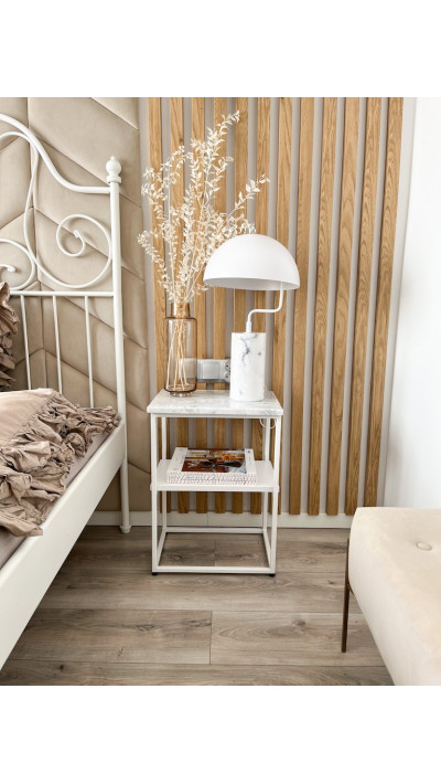 A modern nightlight with a marble cylinder and a semicircular white shade A modern nightlight with a marble cylinder and a semicircular white shade