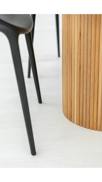 A light-colored veneer table for the kitchen or dining room