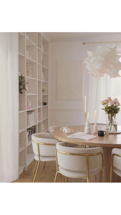 A table with soft lines and a warm wood tone