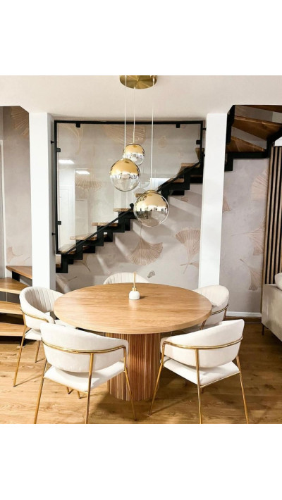 Wooden dining table with a single central leg